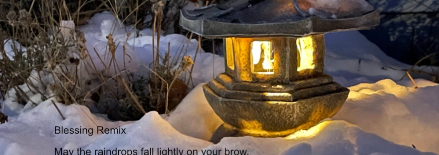 An Ishidoro lantern shining in the night snow
