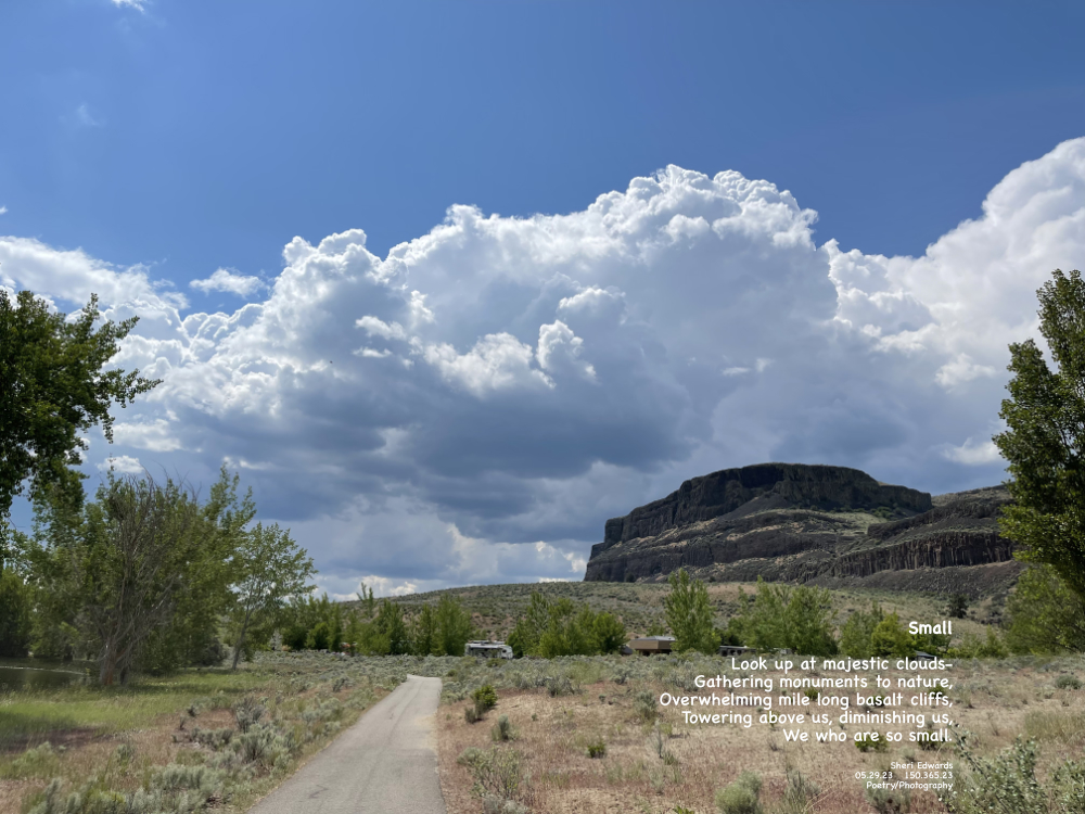 Magnificent clouds gather, soon to be a storm, above the south end of mile-long Steamboat Rock.